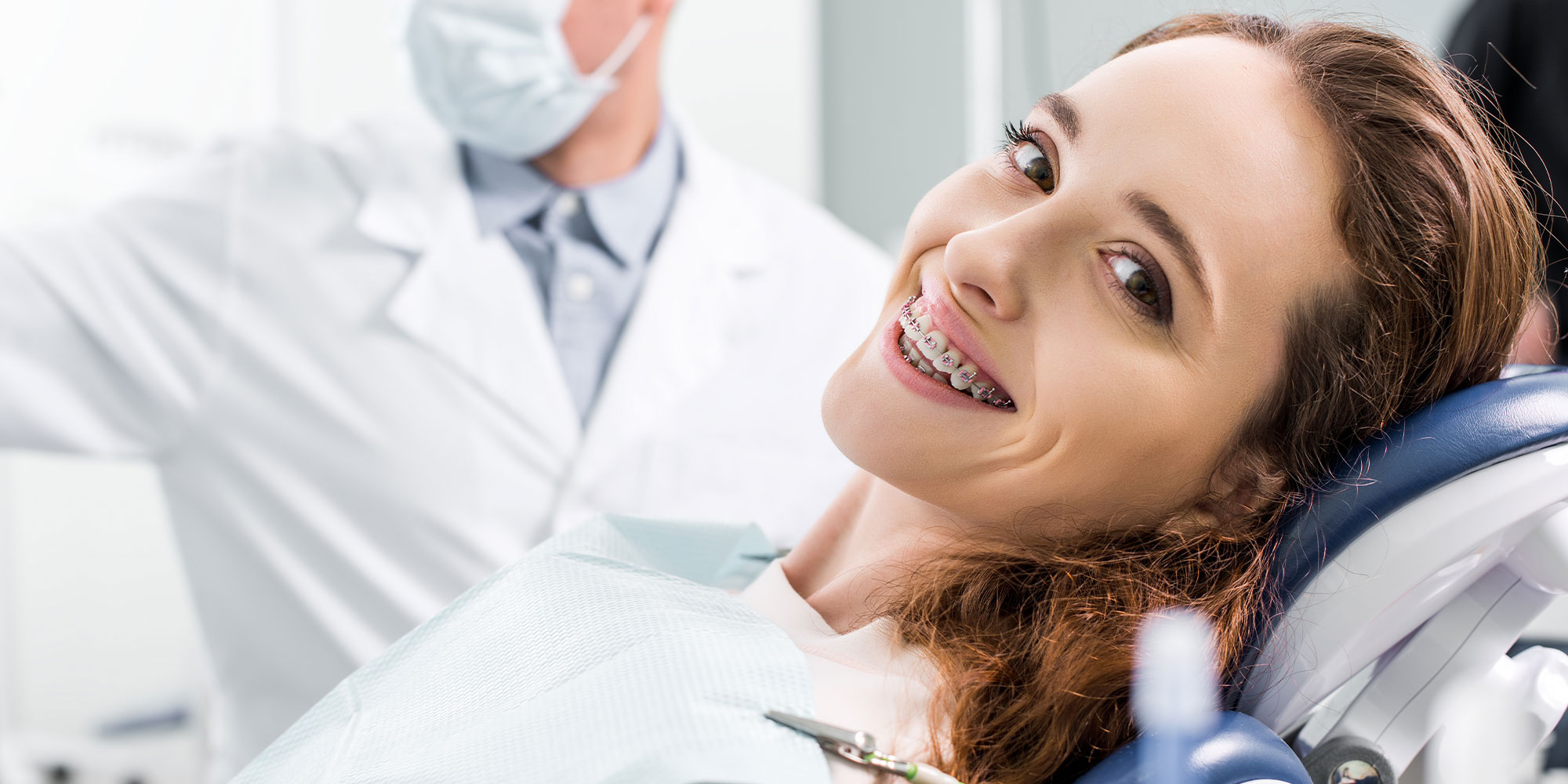 Doctor checking on Patients braces