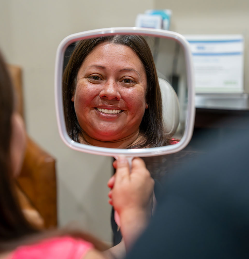 Patient looking into mirror