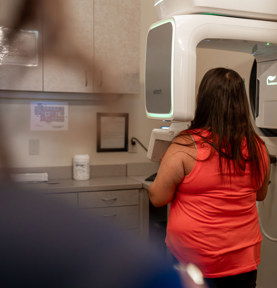 Patient taking a dental x-ray
