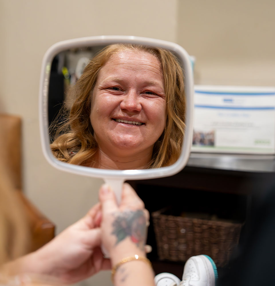 Patient Looking into mirror Smiling