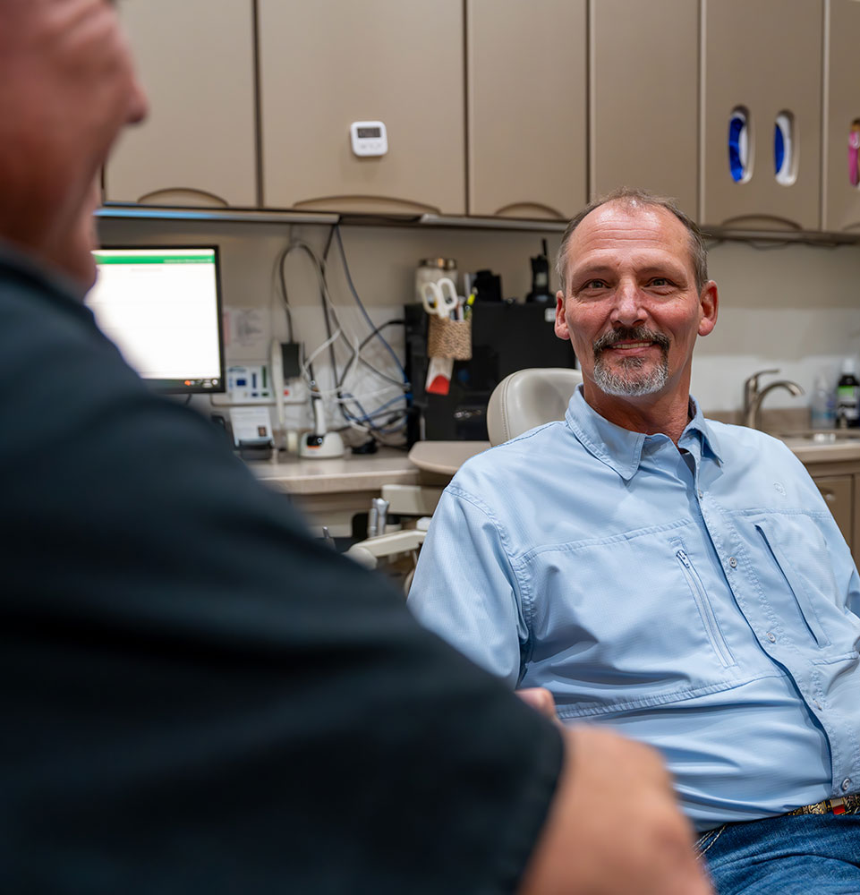 Patient smiling at Doctor