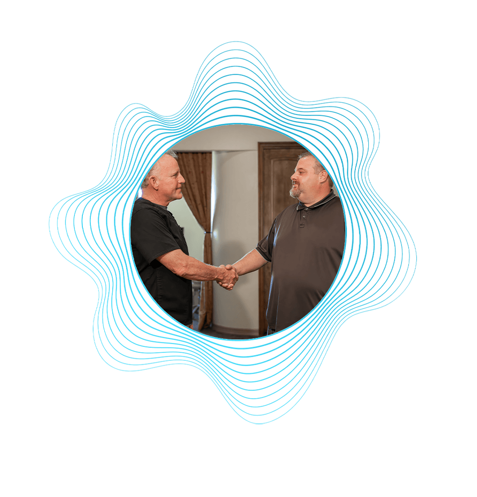 Patient shaking doctors hand