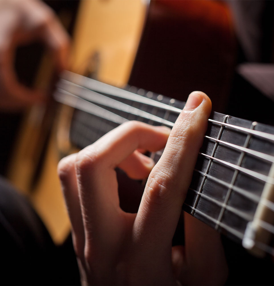 man playing guitar