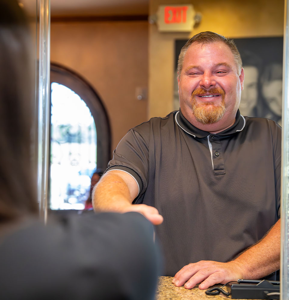 Patient checking into dental office
