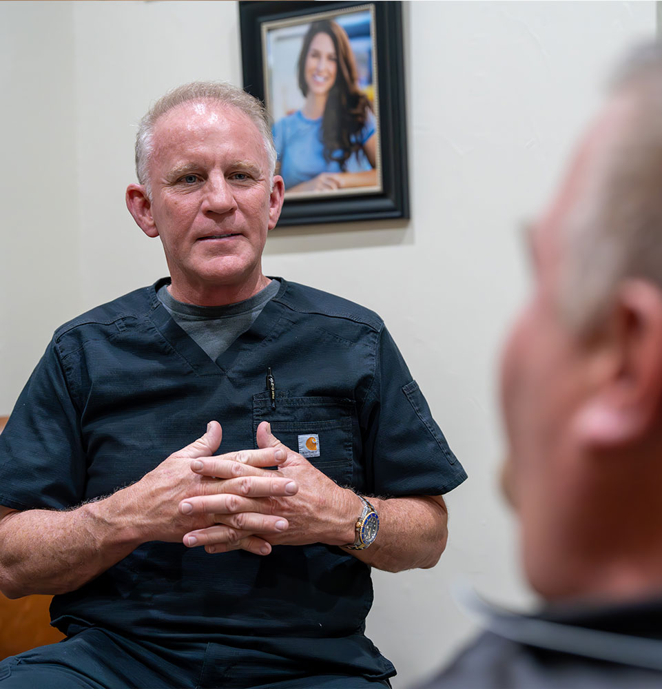 Doctor going over tmj solutions with Patient